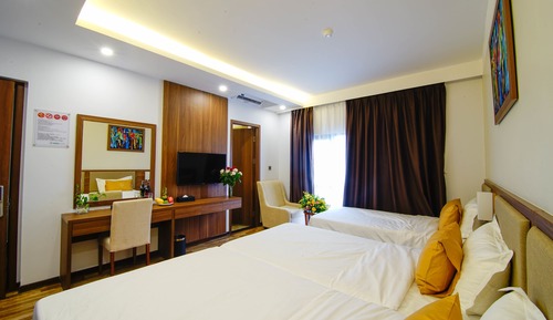 Habitación triple Deluxe