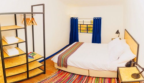 Habitación Deluxe, 1 cama de matrimonio, baño compartido