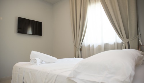 Suite junior, baño privado, vistas al jardín