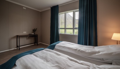 Habitación Deluxe con 1 cama doble o 2 individuales, baño privado