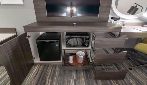 Habitación, frigorífico y microondas