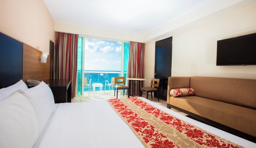 Krystal Club with Balcony Ocean View, King Bed