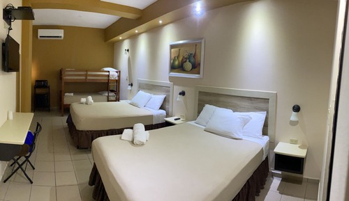 Habitación familiar, varias camas