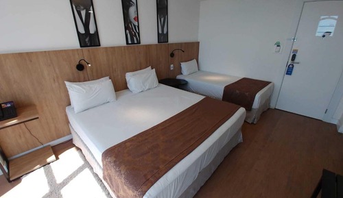 Habitación triple superior, varias camas