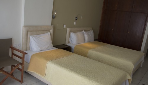Habitación triple, vistas al mar
