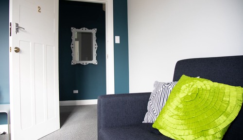 Habitación triple Deluxe, varias camas