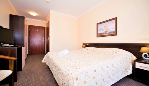 Habitación estándar con 1 cama doble o 2 individuales, balcón