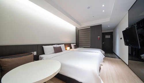 Habitación familiar con 2 camas individuales