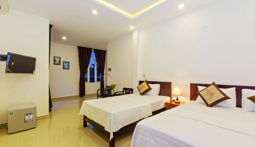 Habitación triple Deluxe, balcón, vistas al jardín