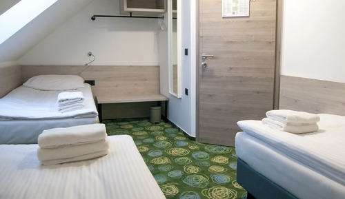 Habitación triple, baño compartido