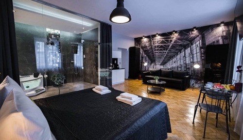 Suite estudio superior, 1 cama de matrimonio con sofá cama, bañera de hidromasaje