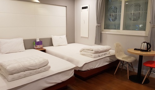Habitación con 2 camas individuales