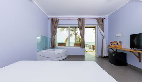 Habitación de lujo, 1 cama de matrimonio grande, vistas al mar (Bungalow Beachfront)