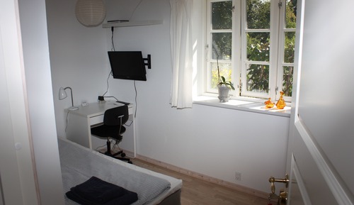Habitación individual, baño compartido