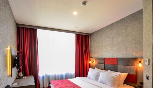 Habitación estándar con 1 cama doble o 2 individuales