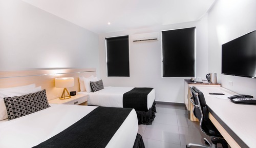 Habitación Deluxe doble, varias camas