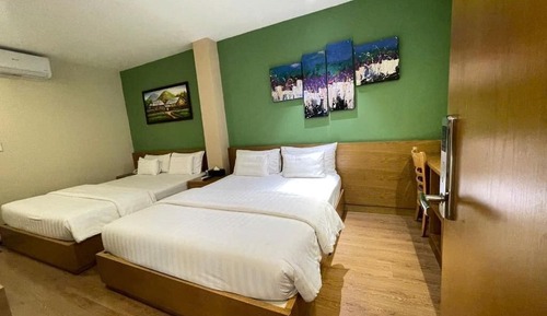 Habitación cuádruple ejecutiva