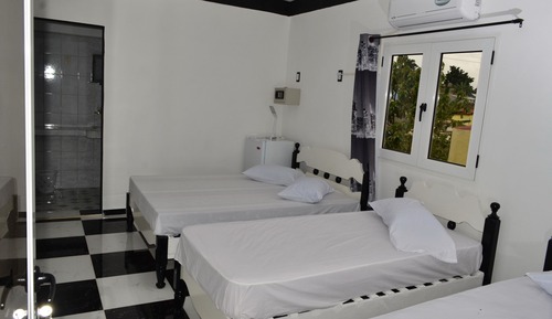 Habitación superior con 1 cama doble o 2 individuales