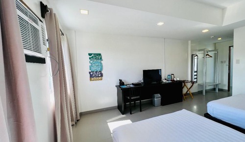 Habitación cuádruple Deluxe