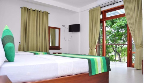 Habitación cuádruple Deluxe