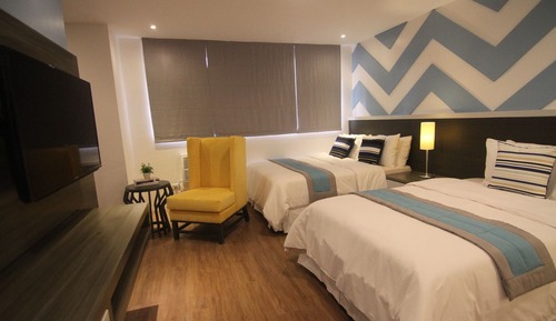 Habitación triple Deluxe, varias camas, no fumadores