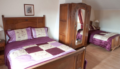 Habitación familiar, varias camas, no fumadores, vistas al jardín