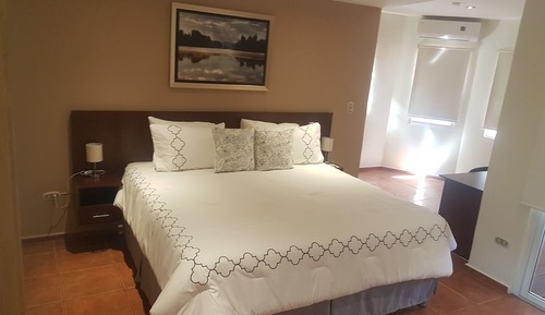 Habitación ejecutiva, varias camas