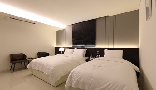 Habitación con 2 camas individuales