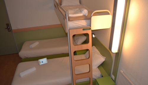Habitación triple, varias camas