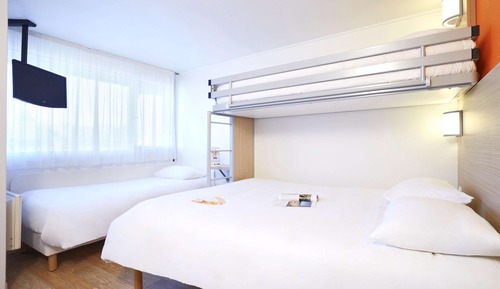 Habitación superior, varias camas