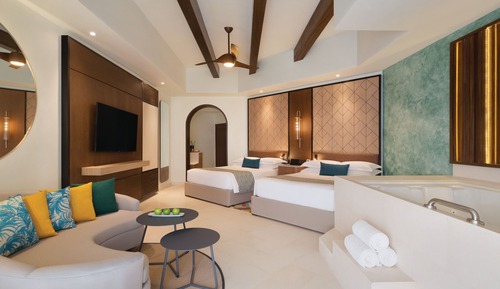 Suite junior, 2 camas de matrimonio, vistas al jardín