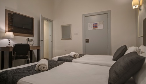 Habitación estándar con 1 cama doble o 2 individuales