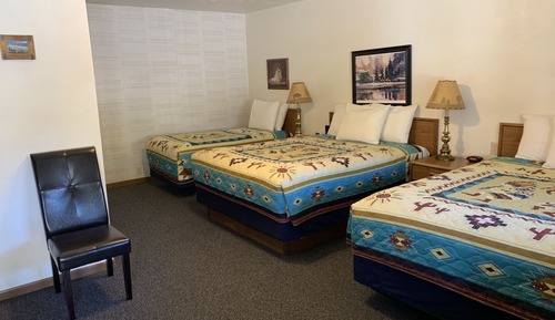 Habitación triple (Two queen beds and one Twin bed)