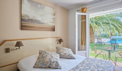 Habitación Club, en la zona del jardín
