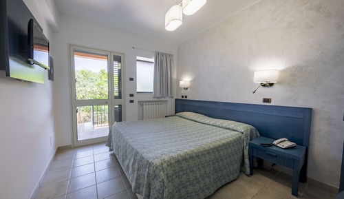 Habitación Confort con 1 cama doble o 2 individuales, en edificio anexo