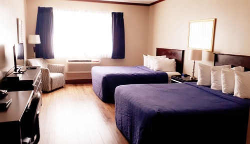 Habitación ejecutiva, 2 camas de matrimonio, frigorífico y microondas, vistas a la montaña
