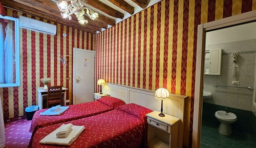 Habitación clásica con 1 cama doble o 2 individuales