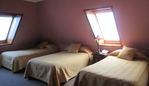 Habitación triple, vistas a la ciudad
