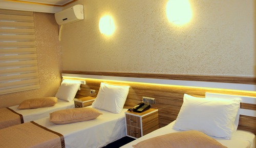 Habitación triple Deluxe