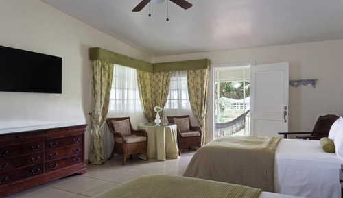 Suite junior, 2 camas de matrimonio, vistas al jardín