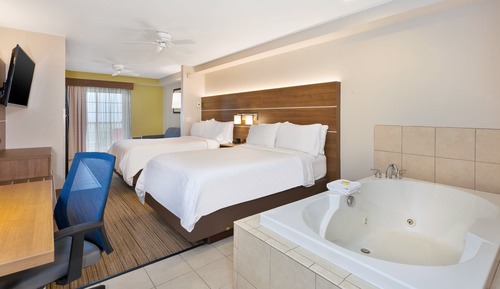 Suite, 2 camas dobles (Additional Living and Dining Area)