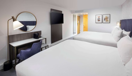Habitación Deluxe, varias camas