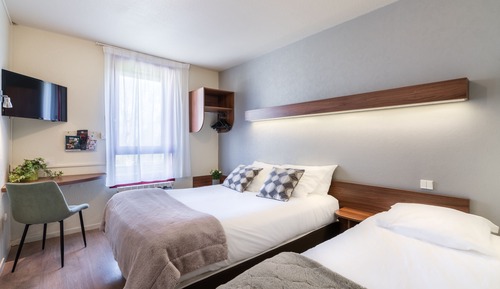 Habitación triple Confort, vistas al jardín