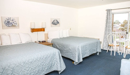Habitación Deluxe, 2 camas de matrimonio, vistas al mar