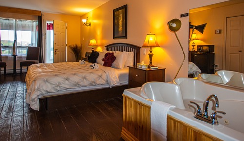 Suite, 1 cama de matrimonio grande, bañera de hidromasaje (Fireplace)