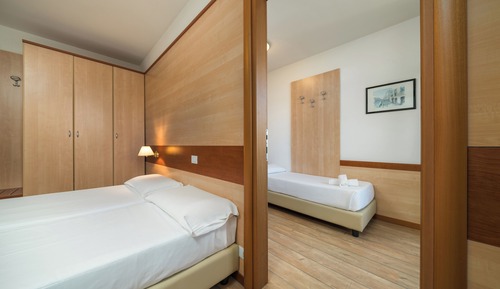 Habitación familiar, varias camas