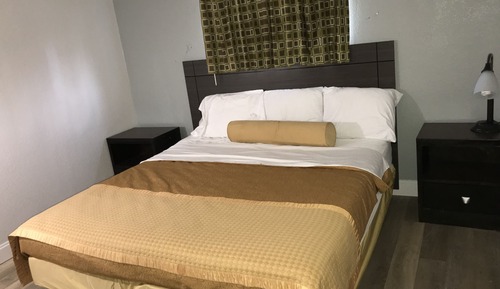 Two Room Suite with Kitchenette | 1 King & 1 Double Bed