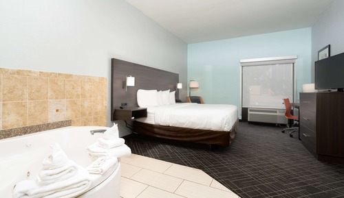 Suite, 1 cama de matrimonio grande, bañera de hidromasaje