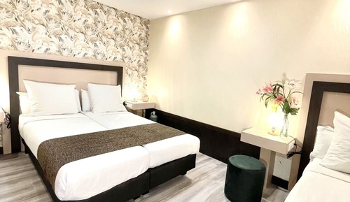 Habitación triple Deluxe