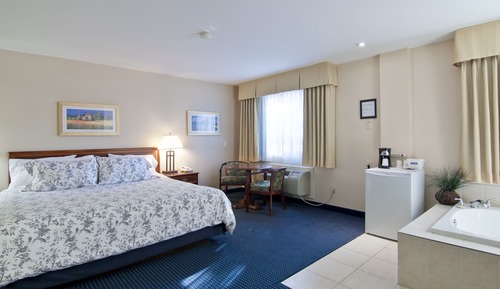 Suite, 1 cama de matrimonio grande, bañera de hidromasaje